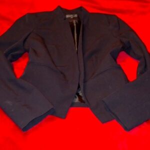 WORTHINGTON. Black, long sleeved blazer with open front.